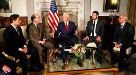 U.S. Vice President Mike Pence, center, speaks with Venezuelan opposition leaders, from left, Carlos Vecchio, Julio Borges, David Smolansky and Antonio Ledezma during a meeting at the residence of the U.S. ambassador in Lima, Peru, in April 2018.