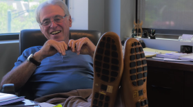 Norman Lippitt puts his feet up in his Birmingham, Mich., office.<em> </em>