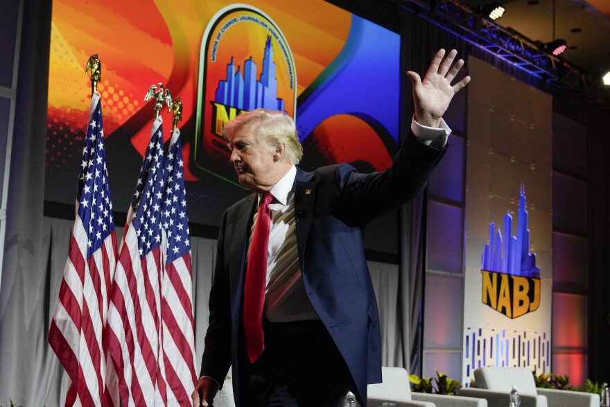 Republican presidential candidate former President Donald Trump walks off stage after speaking at the National Association of Black Journalists, NABJ, convention, Wednesday, July 31, 2024, in Chicago. (AP Photo/Charles Rex Arbogast)