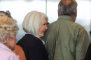 Tina Peters waits for an elevator at the Mesa County Justice Center following closing arguments on the final day of her criminal trial. The former Mesa County clerk was found guilty on 7 of 10 charges.