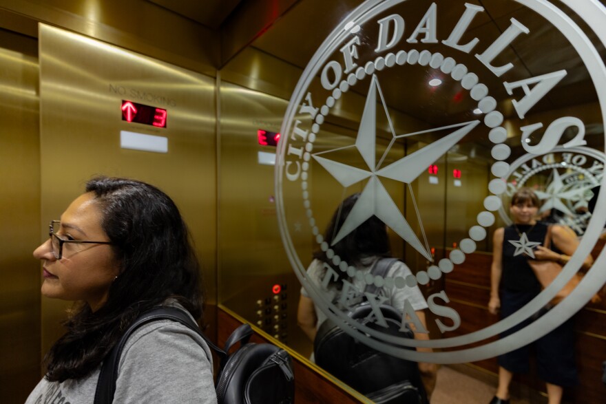 Singleton United/Unidos Director Janie Cisneros stands in a Dallas City Hall elevator after being redirected to a different department. It was Cisnero's daughters birthday and she was late picking her up after she had hoped to file an application that could help her West Dallas community in getting an 80-year-old shingle plant shut down.