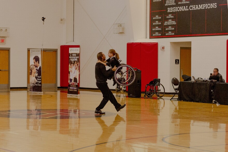 Zoey Spencer dances with her dad, Neil, before they compete.