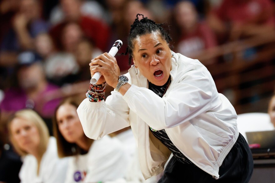 South Carolina head coach Dawn Staley directs her team against Southern California during the first half in the second round of the NCAA college basketball tournament, Monday, March 23, 2026, in Columbia, S.C. (AP Photo/Nell Redmond)