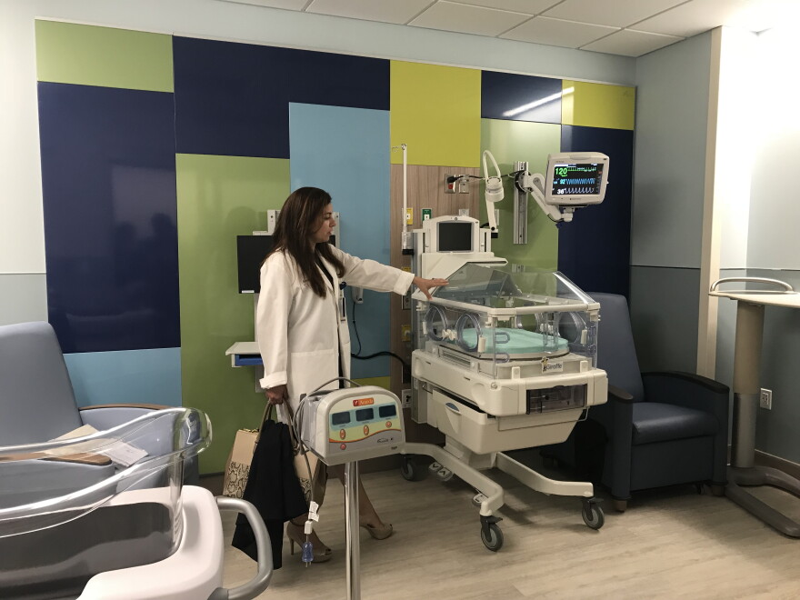 The medical director for neonatology, Dr. Arlene Boykin, shows off the features of the new neo-natal intensive care unit, or NICU. The incubator beds, called isolettes, are an upgraded version from the ones on the current floor.  