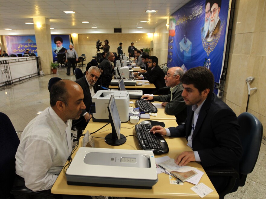 Iranian men register their candidacy for the June presidential election at the Interior Ministry in Tehran earlier this month. Some 700 candidates have registered, but most will be disqualified.