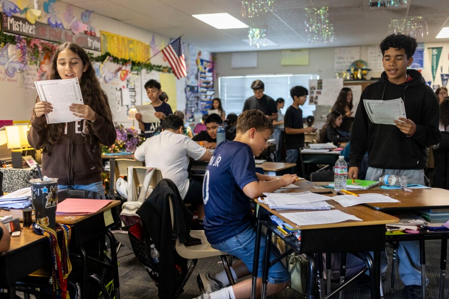 Sixth graders read a passage and give constructive feedback to their partners during Nancy Barajas' class at Fairview Elementary School on Wednesday, May 6, 2026, in Modesto, Calif.