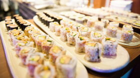 Chefs prepare sushi specialties during the official opening of the Nobu Hotel at City Of Dreams.