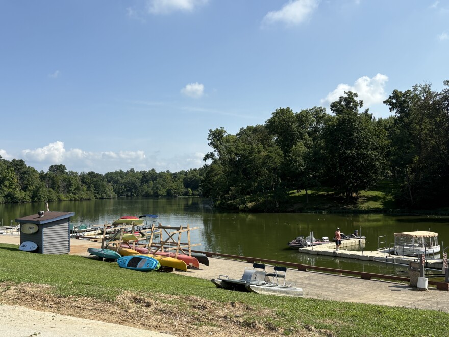 Canoes and small boats on the dock of Armco Lake.