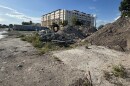 Demolition underway Tuesday at Li'l Abner Mobile Home Park.