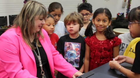 Rachel Marlow, Central Elementary School's music teacher, leads her class in song. She's been designated as the next teacher of the year in Kansas.