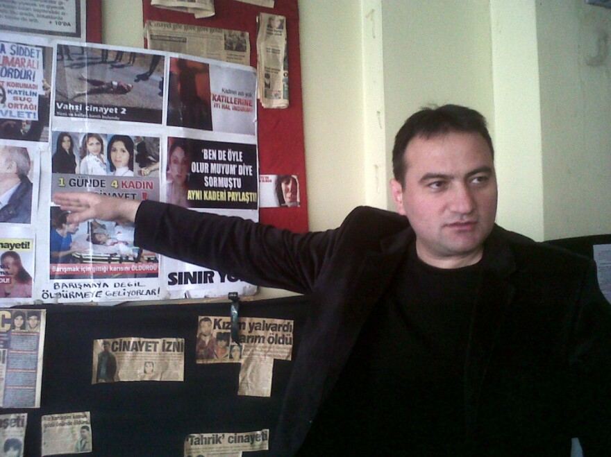 Hayrettin Bulan, a women's rights activist, points to cases of abused Turkish women. His proposal to arm and train women in self-defense has reignited a debate in Turkey about how best to combat violence against women.