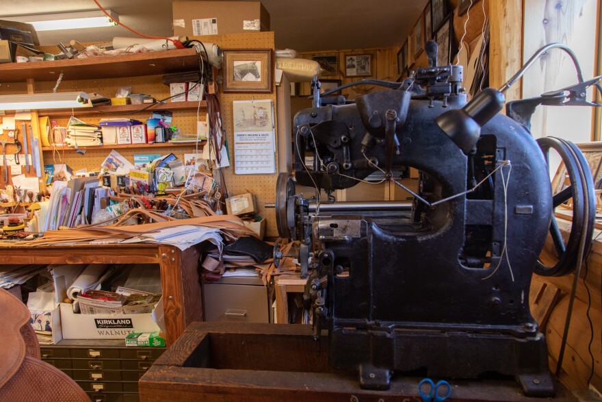 A large black old sewing machine. 