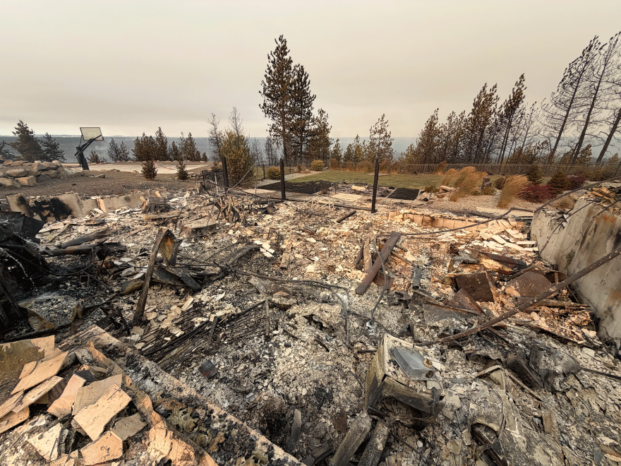 Ryan Herzog and Annie Voy, partners and economics professors at Gonzaga University, lost their home in early August as a trio of wildfires swept through north Spokane. Almost nothing was salvageable after the fire destroyed their home the afternoon of Aug. 1, according to Herzog.
