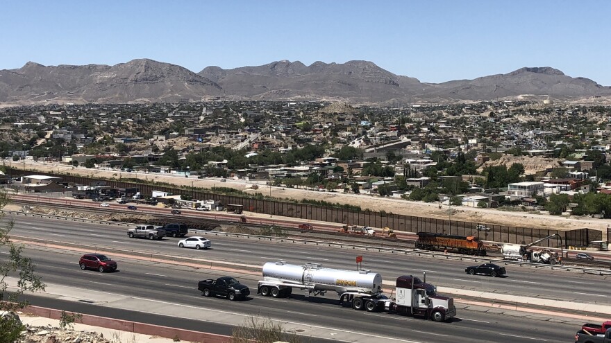 A brown fence marks the border between El Paso, Texas, and its Mexican sister city, Juarez. As security at the border increases under the Trump administration, young people who regularly commute back and forth are taking more precautions.