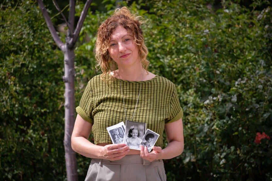 Salt Lake City-based artist Cara Despain holds photos of her mother Bonnie, Aug. 26, 2026. Bonnie Despain grew up in southern Utah 130 miles from the Nevada Test Site where 100 atmospheric nuclear tests were conducted in the years after WWII. She died in February of ALS, and a fragment of her bones was found to contain an abnormal amount of cesium, which can be formed in a nuclear reaction.
