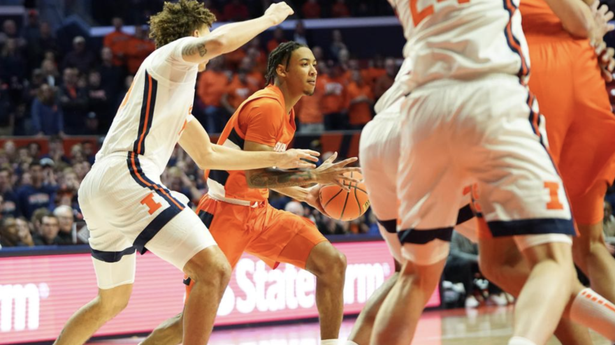 Syracuse Men’s Basketball guard Judah Mintz struggles to penetrate through Illinois’ defense Tuesday night. The freshman shot just 3-16 against the Illini.