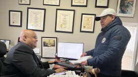 Overcoming Obstacles, Mr. Joe Chávez on the right diligently navigates the complexities of worker's compensation with the support of attorney Amado Vargas, despite immigration challenges.