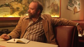 Journalist Arnie Blondestone (Paul Giamatti) interprets the bizarro story at the heart of the too-twisty horror fantasy <em>John Dies at the End.</em>