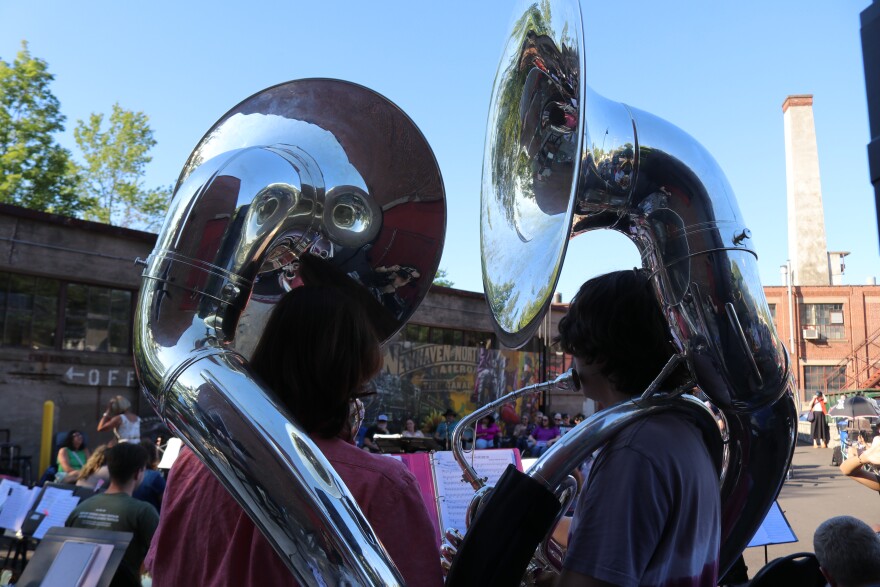 Max (left) and John (right) play sousaphones