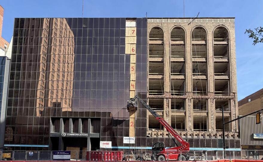 The future Gateway Apartments project on East Main Street in downtown Rochester encompasses the century-old Gateway (left) and Cornwall (right) buildings. In this photo from May 16, 2026, the removal of glass panels has exposed only the Cornwall Building.