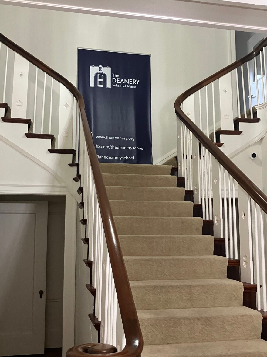 The main stairway at The Deanery, 1103 Main St., Davenport.
