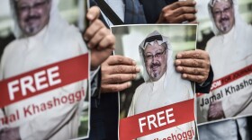 Protesters hold pictures of missing journalist Jamal Khashoggi during a demonstration in front of the Saudi Arabian consulate on Oct. 8, 2018 in Istanbul. (Ozan Kose/AFP/Getty Images)