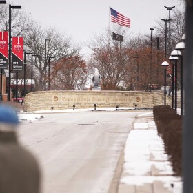 A light dusting of snow covers the sidewalks at Youngstown State University.