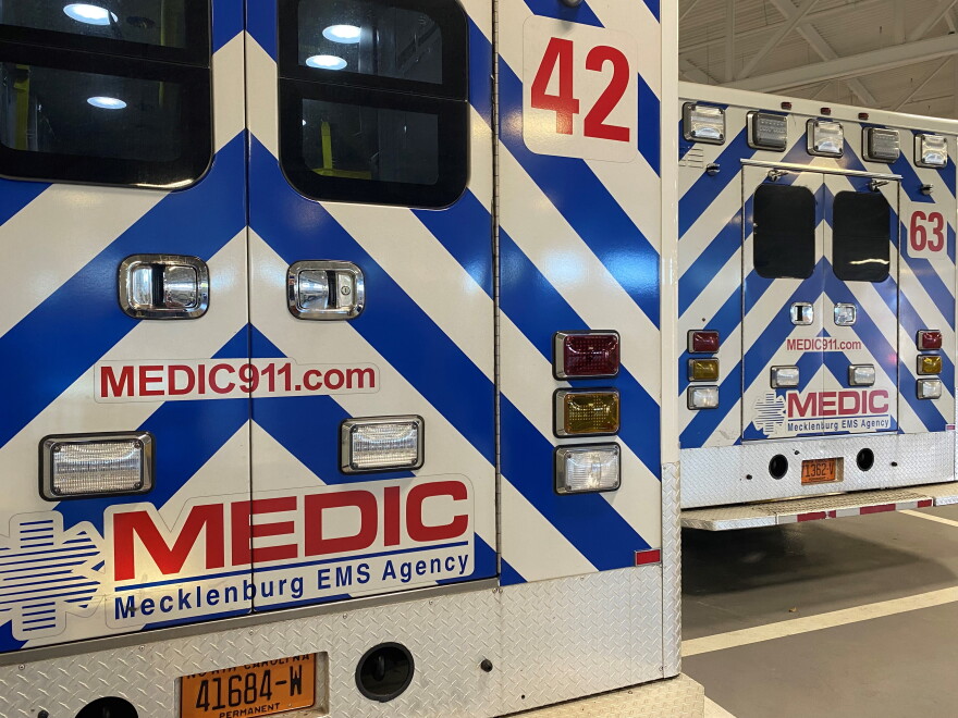 Ambulances sit parked inside Medic's Charlotte headquarters.