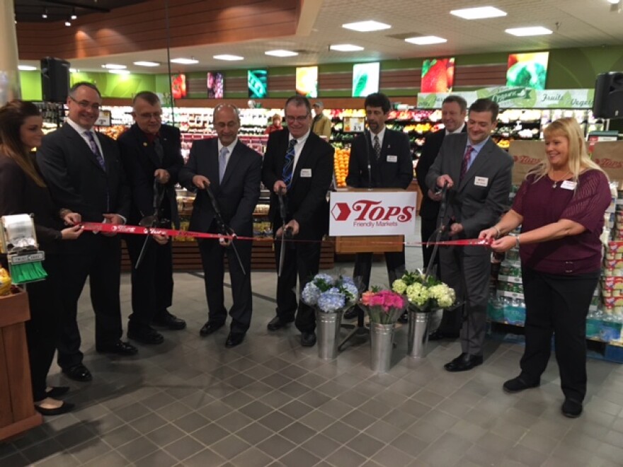 Cutting the ribbon on the Farmington Tops