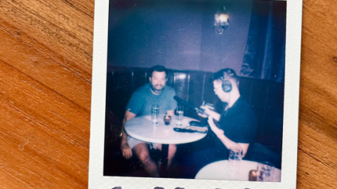 Every guest who visits Antagonist leaves with a Polaroid photo taken by staff. That includes WFAE’s Nick de la Canal, photographed mid-interview with bar co-owner Mike Salzarulo.