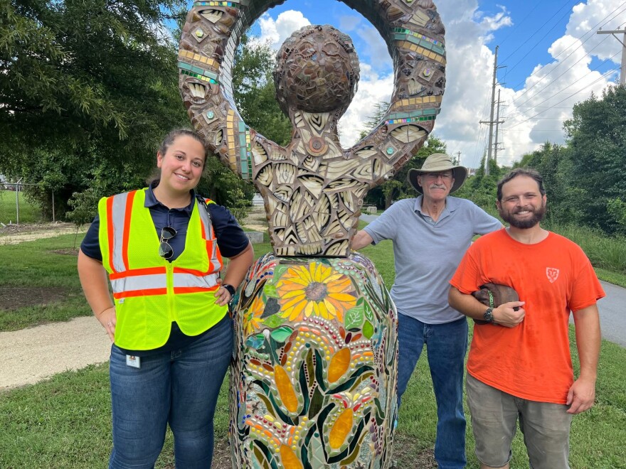 Members of Southwest Renewal and community partners test water quality in local creek.