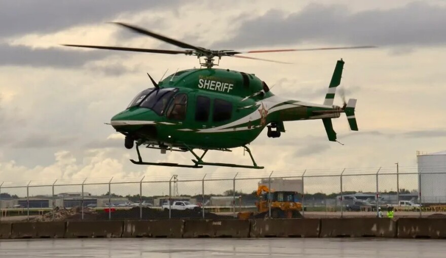 A Palm Beach County Sheriff’s Office helicopter landing at Palm Beach International Airport.