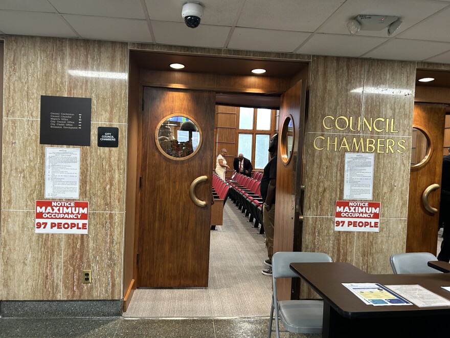 Signs posted outside the council's chambers Tuesday contain a section of city code with rules for public speakers at City Council meetings.