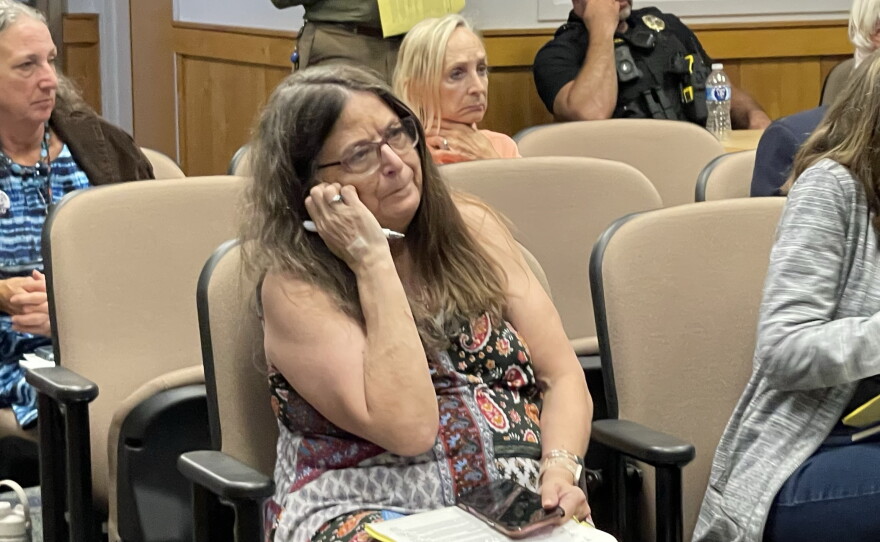City of Alachua residents who studied the agenda expressed concern about the verbiage of the ordinance on data centers. (Dulce Rodriguez-Escamilla/WUFT News)