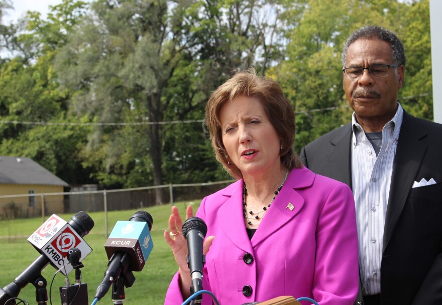 Republican U.S. Rep. Vicky Hartzler (foreground) and Democratic Rep. Emanuel Cleaver speak after a September meeting at the Kansas City VA Medical Center