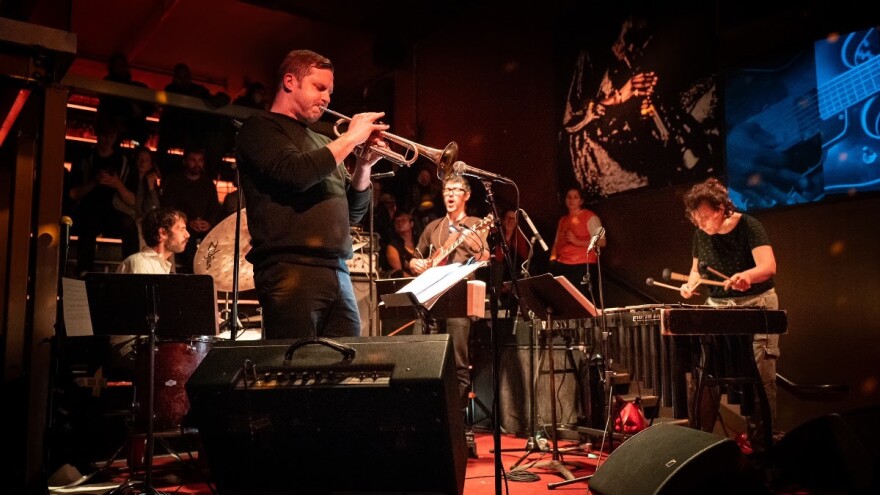 The Dan Weiss Quartet, featuring drummer Dan Weiss (left), trumpeter Peter Evans (center-left), guitarist Miles Okazaki (center-right), and vibraphonist Patricia Brennan (right).