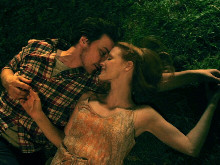 The film may have scenes in common — like this one in which the couple, played by James McAvoy and Jessica Chastain, cuddles on the grass in a park — but each version carries a different mood.