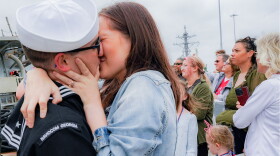 Cryptologic Technician 3rd Class Brett Roberson kisses his wife, Cryslyn, after the USS Ramage returns to Norfolk. Dec. 3, 2023. Department of Defense