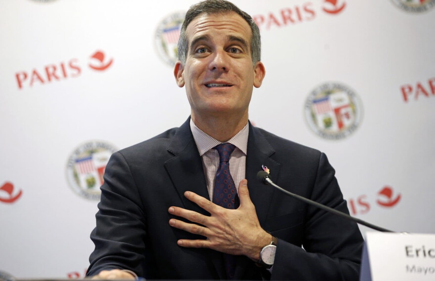 In this Oct. 23, 2017 file photo, Los Angeles Mayor Eric Garcetti speaks prior to signing a partnership agreement with his Paris counterpart Anne Hidalgo regarding the Olympic Games in Paris. (Thibault Camus/AP)