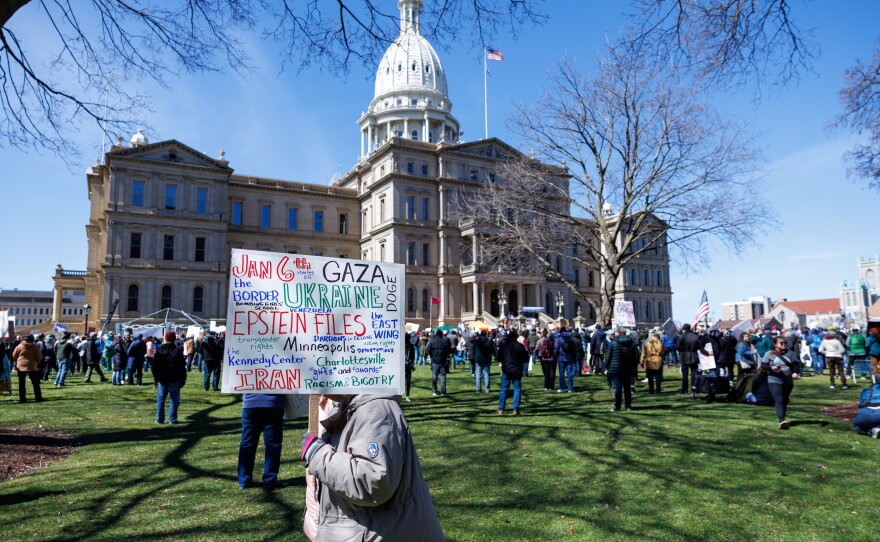 Thousands gathered at the Michigan Capitol in Lansing, Mich., on March 28, 2026, for a No Kings rally.