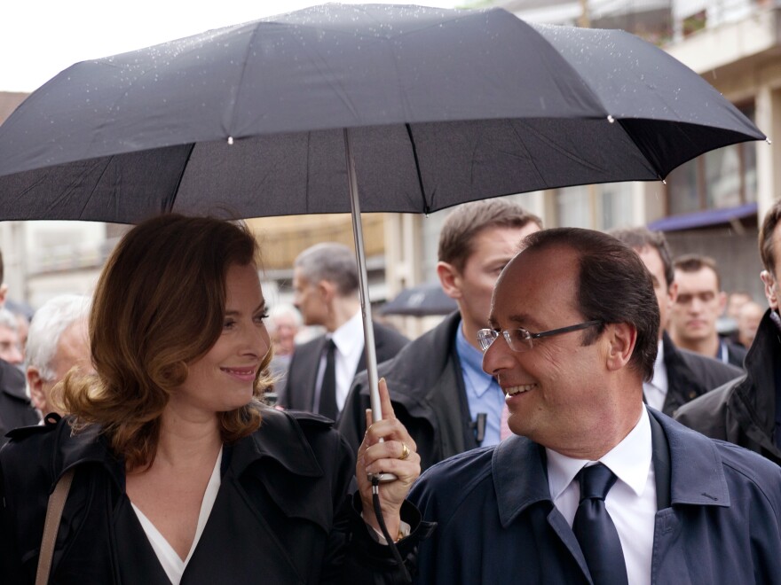 French President Francois Hollande (right) with his companion, Valerie Trierweiler, in Tulle, southwestern France, on June 9. Hollande campaigned as a down-to-earth politician, the opposite of his scandal-prone predecessor, Nicolas Sarkozy.