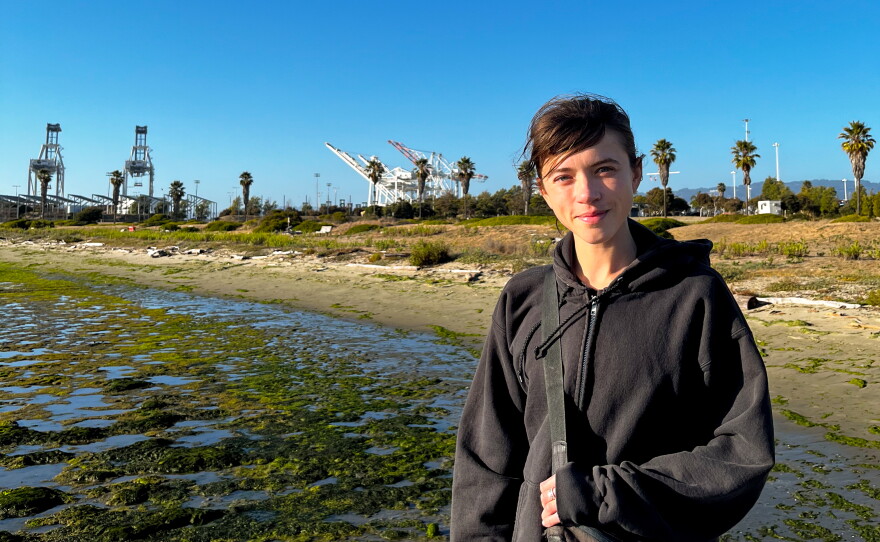 Maria BC standing in front of the port cranes at Middle Harbor Park. 