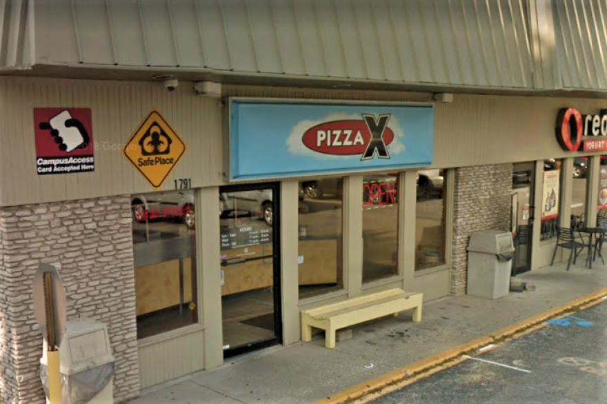 The Pizza X location on 10th Street.