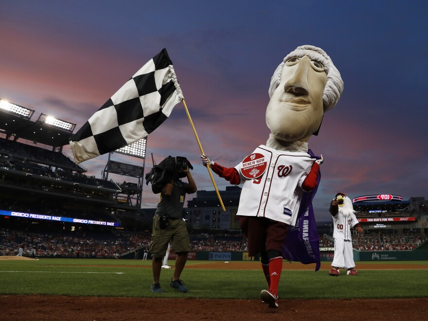 Washington Nationals racing presidents mascot Thomas Jefferson wins the race during the fourth inning of a baseball game between the Nationals and the Miami Marlins in 2017.