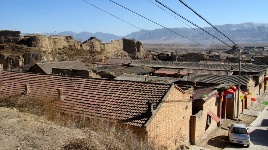 The beige soil around Nuanquan Town is made up of compacted dust. The area lies outside the Great Wall, and for centuries was a frontier region where the ethnic Han people fought, traded and mixed with nomadic tribes of the Central Asian Steppe.