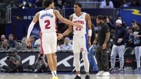 Detroit Pistons guard Jaden Ivey (23) is greeted guard Cade Cunningham (2) after a play during the second half of an NBA basketball game against the Brooklyn Nets, Thursday, March 7, 2024, in Detroit. (AP Photo/Carlos Osorio)