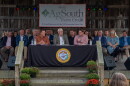 Senator Ted Budd, North Carolina Agricultural Commissioner Steve Troxler and USDA Deputy Secretary Stephen Vaden sign the block grant in Fletcher on August 5, 2025.
