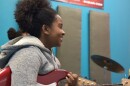 Jacksonville Arts and Music School student Linnai of House Davis (Music) playing bass guitar.