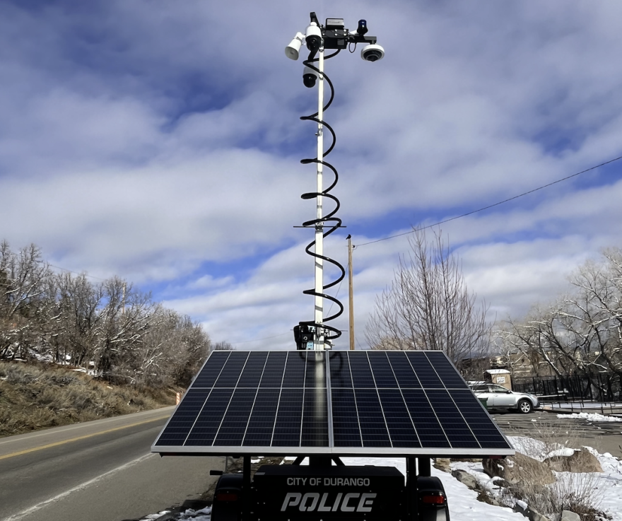 A Flock camera sits by the side of a road in Durango, Colorado.