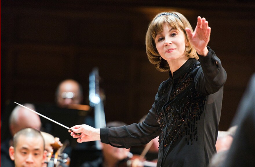 color photo of conductor JoAnn Falletta conducting